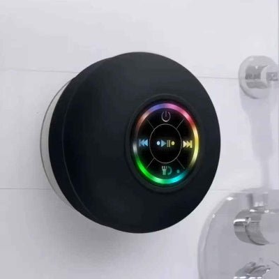 Enceinte portable noire dans salle de bain Miniparleur