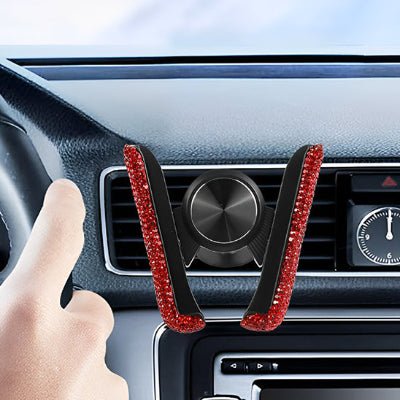 support telephone voiture strasses rouges et la main sur volant