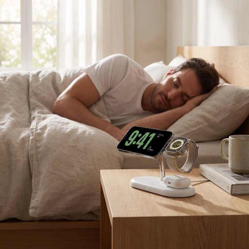 Chargeur sans fil pour téléphone près homme qui dort Troisenun