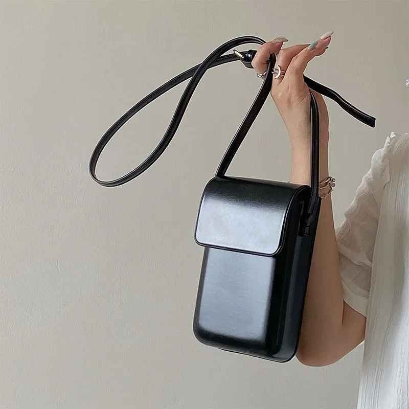 pochette telephone vue en noir Sacraba